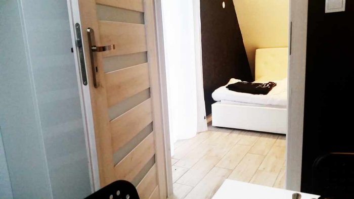 Hotel hel noclegiApartament czteroosobowy z dużym tarasem i oddzielną sypialnią