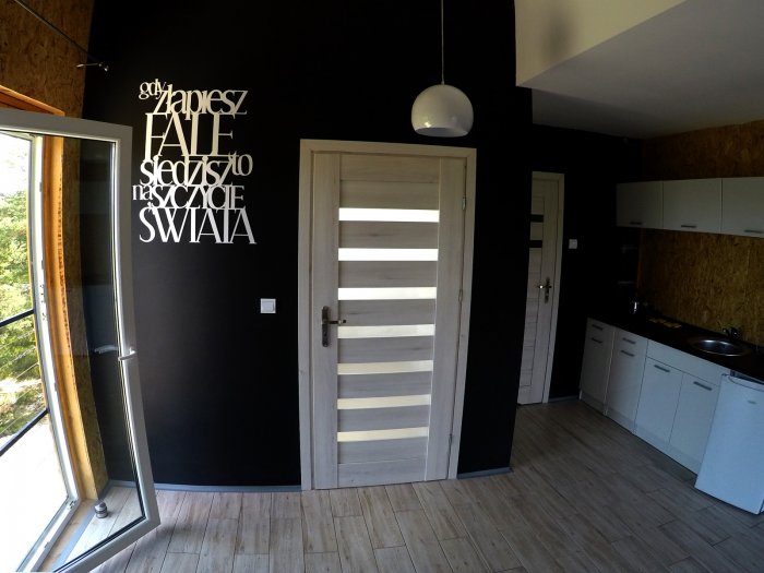 Hotel hel noclegiApartament czteroosobowy z dużym tarasem i oddzielną sypialnią