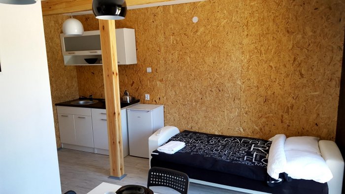 Hotel hel noclegiApartament czteroosobowy studio z balkonem.